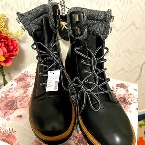 There a nice pair of boots never been worn with tags on them.